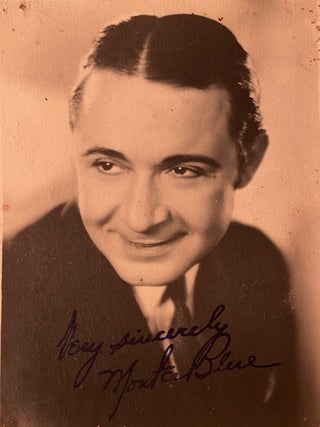Item #018799 Signed portrait photograph. Monte Blue