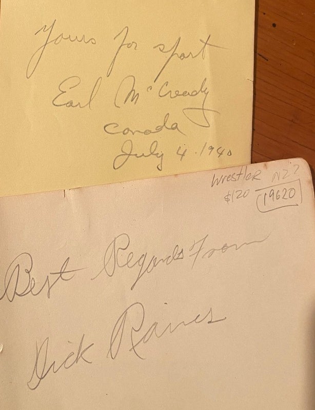 Item #019620 Signatures on slips, wrestlers. Earl McReady, Dick Raines.